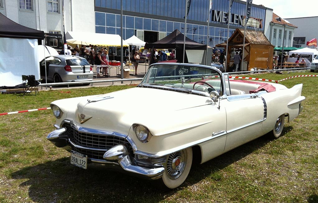 Mercedes-Benz and Porsche museum promotion display at the festival