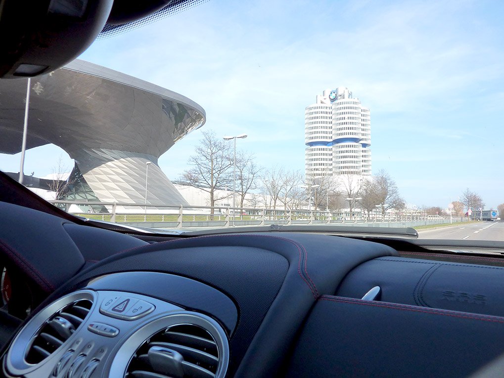 View of BMW Museum, BMW Welt, and BMW headquarters from inside the Mercedes-Benz McLaren SLR 722 Edition