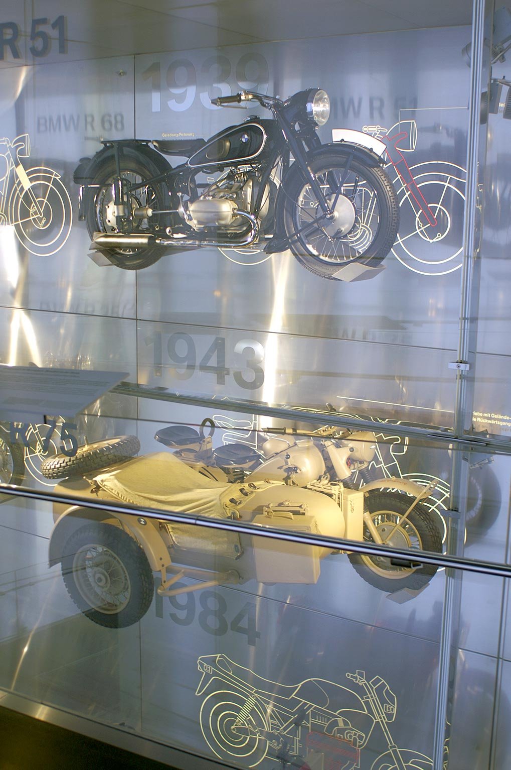 Multi-level motorcycle exhibit wall at the BMW Museum