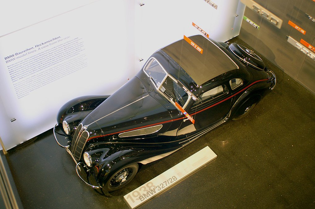BMW 327/28 displayed under the logo installation in the museum