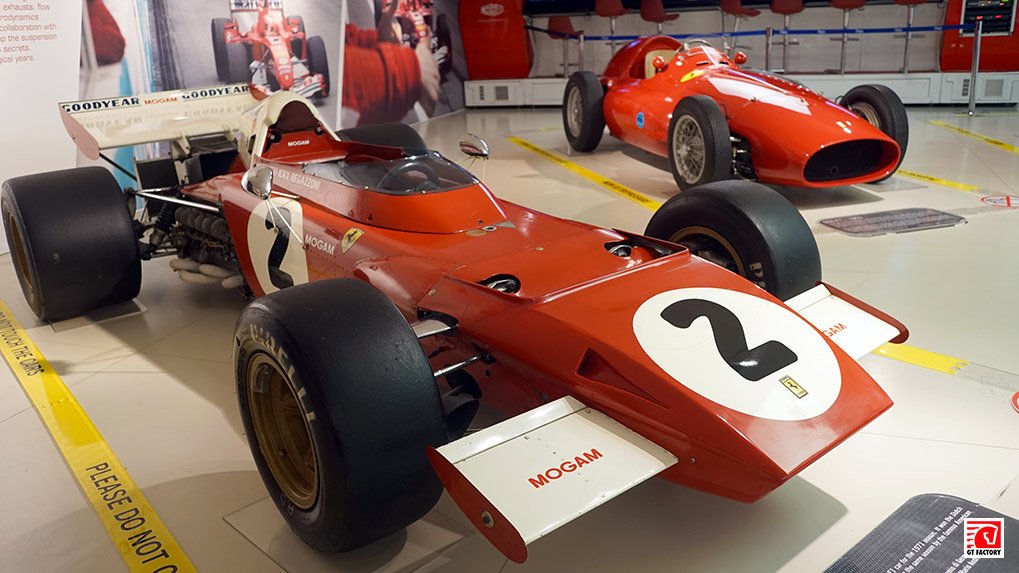 Classic Ferrari racing car displayed in the first hall
