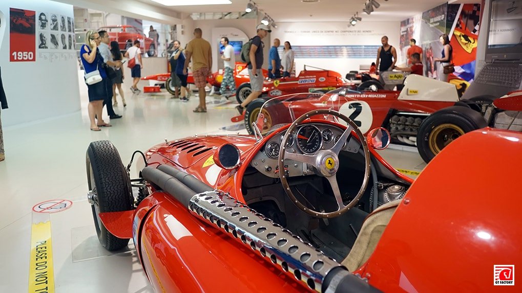 Historic Ferrari race car in the first hall of the museum