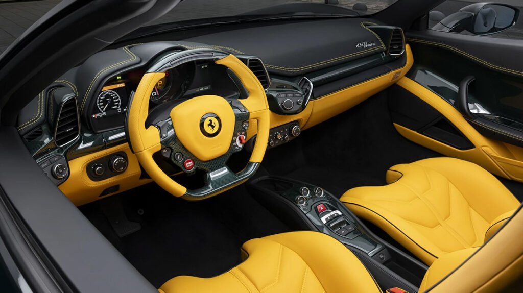 Custom Ferrari 458 Spider interior with yellow leather and green carbon fiber trim