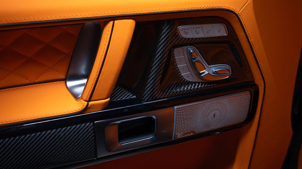 Mercedes-Benz G63 door trim with gloss carbon and Lava Orange leather