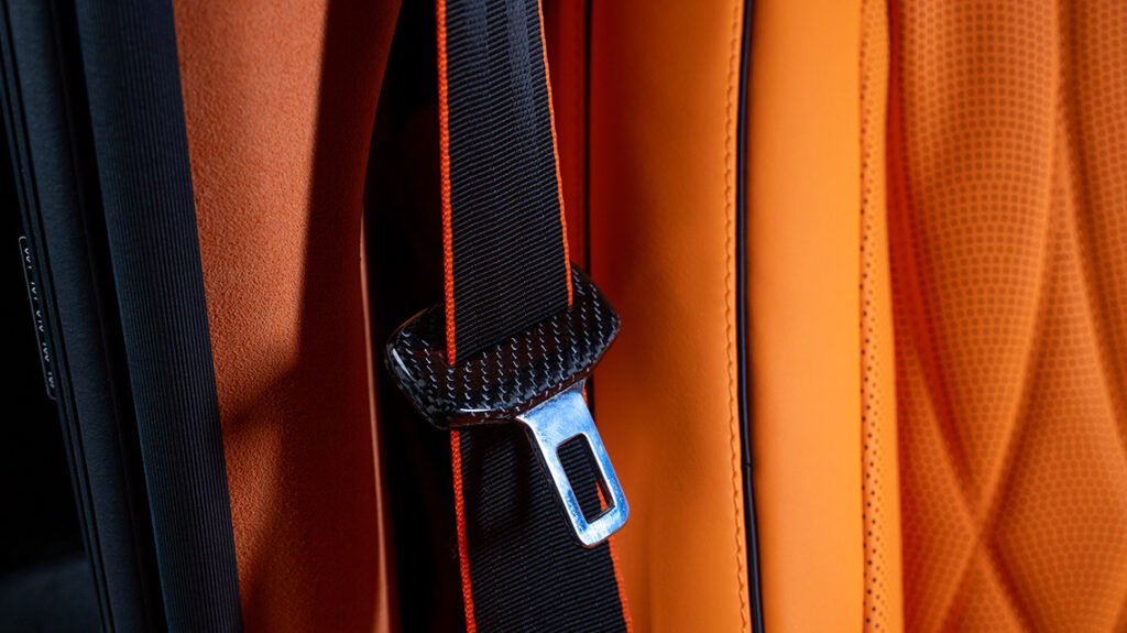 Mercedes-Benz G63 Lava Orange interior with custom seat belt detailing