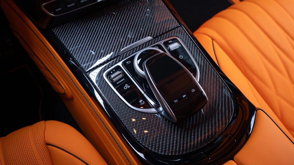 Mercedes-Benz G63 center console with gloss carbon and Lava Orange leather