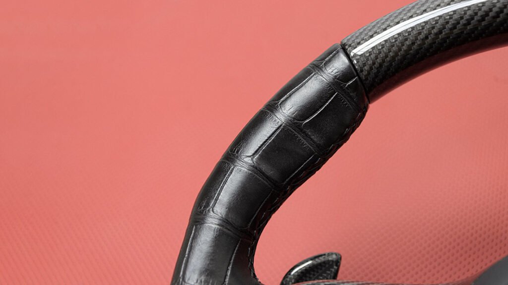 Alligator leather grip detail on Mercedes-AMG G63 signature steering wheel