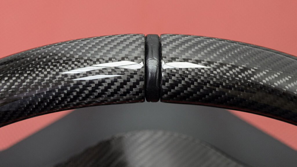 Carbon fiber upper rim detail on Mercedes-AMG G63 signature steering wheel