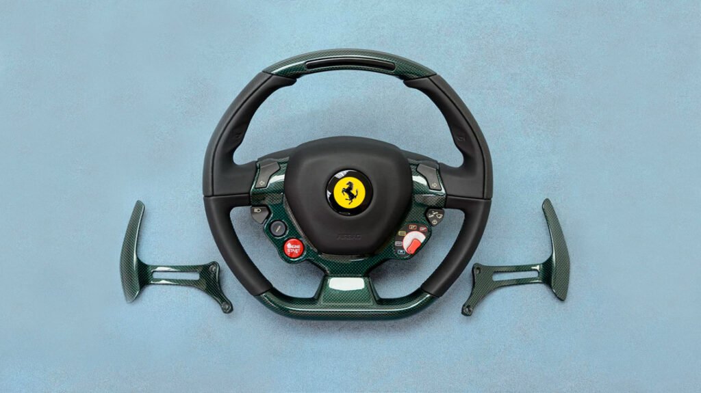 Ferrari 458 bespoke steering wheel with green carbon fiber and paddle shifters