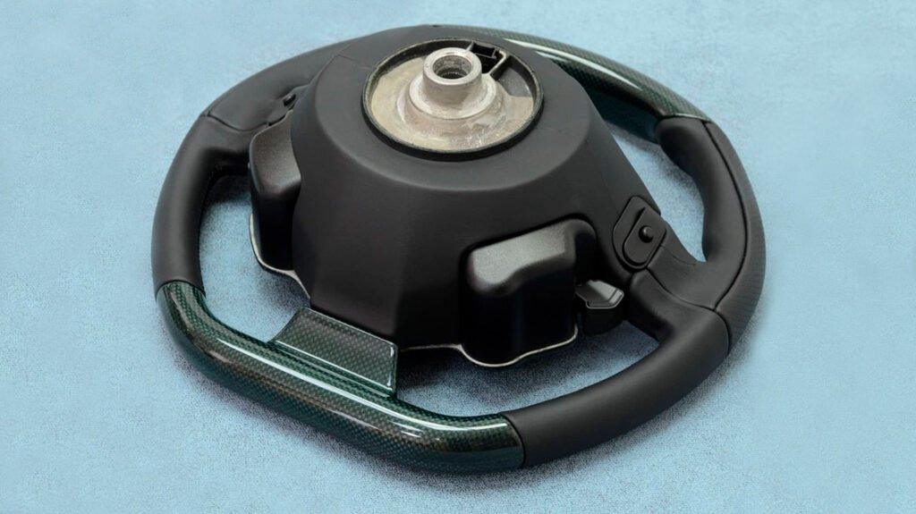 Rear view of Ferrari 458 custom steering wheel with OEM hub assembly