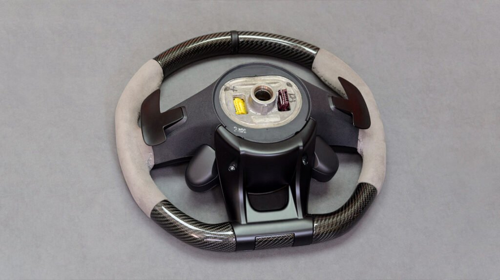 Rear view of Mercedes-AMG G63 custom steering wheel with OEM hub assembly