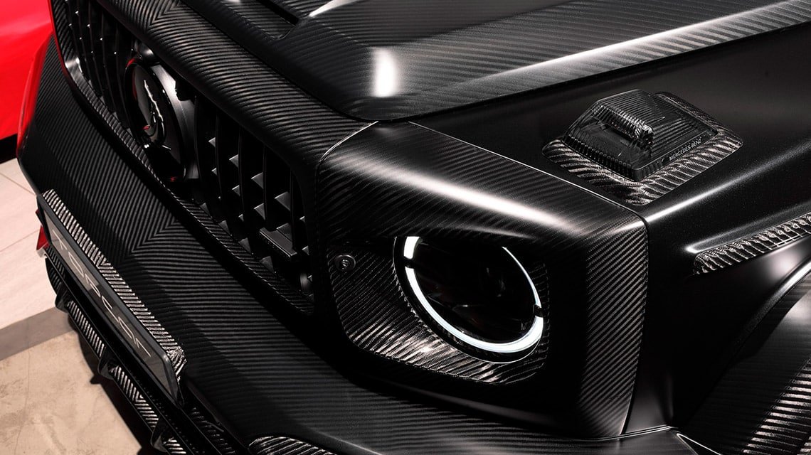 Top Car Design carbon headlight surrounds for Mercedes-Benz G63 AMG W465